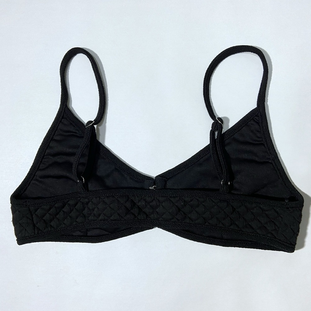 Kittenish Savage Not Sorry quilted bralette with front clasps
#7 stock photo